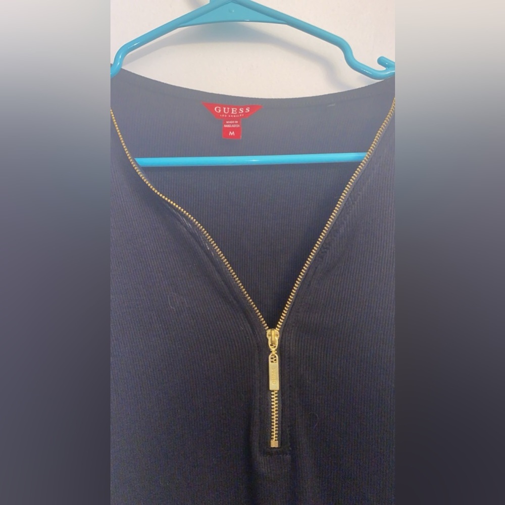 Black blouse guess brand never used size medium but fits large
